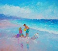 boy and girl with dog on beach